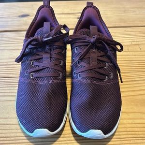 Purple adidas athletic shoe